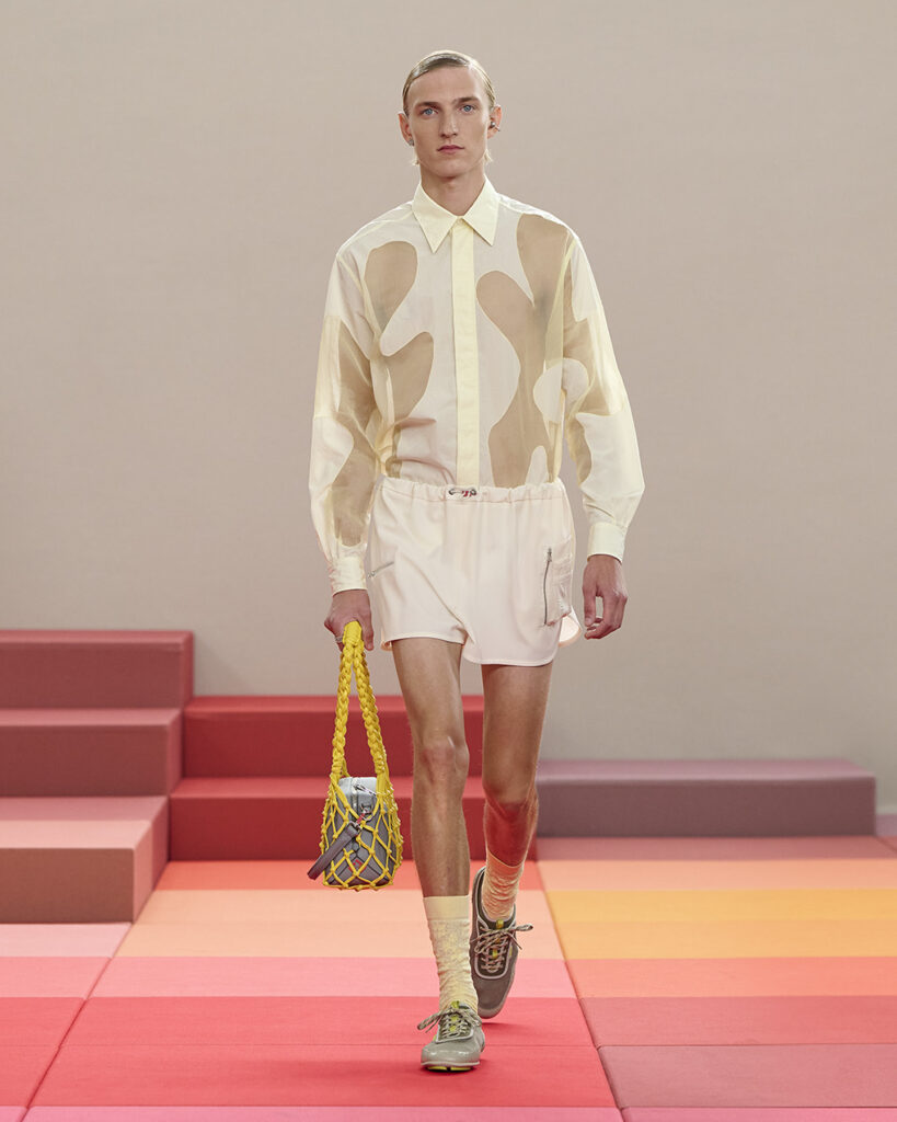A model wears a floral cut-out shirt from the Fendi Spring/Summer 2026 show. 
