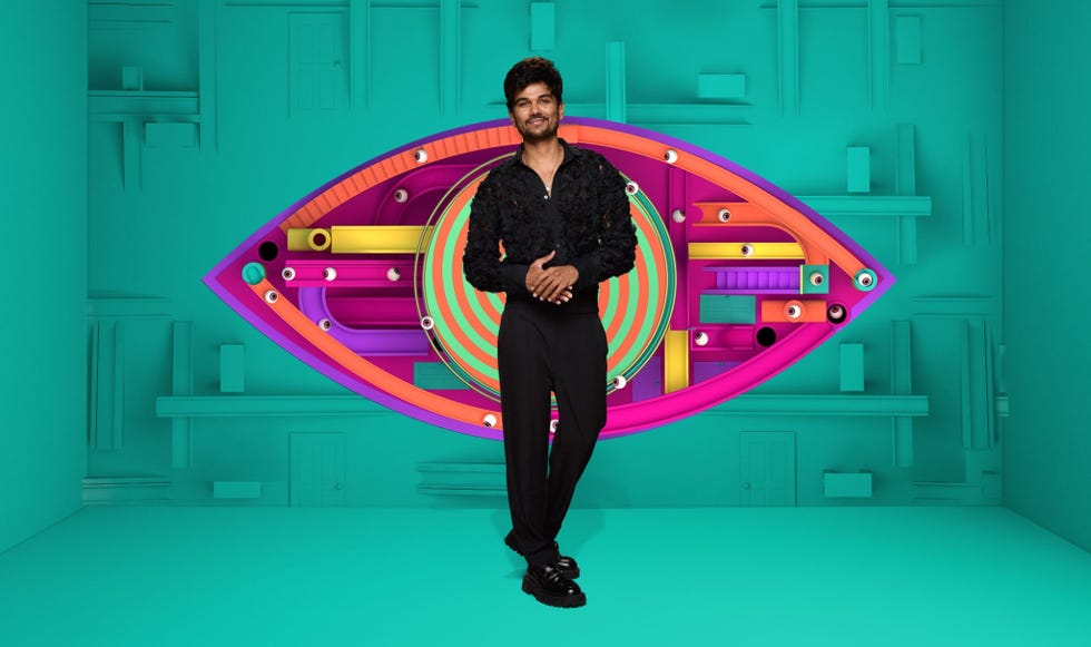 Gani posing in front of the Big Brother eye