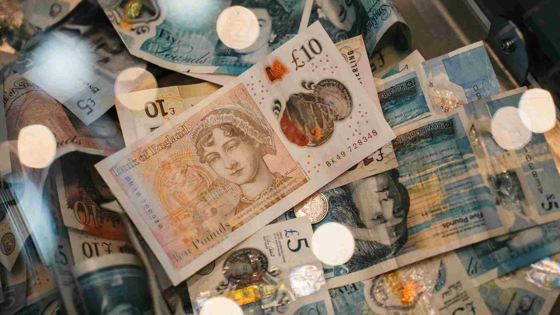 Stock photo of a load of British bank notes