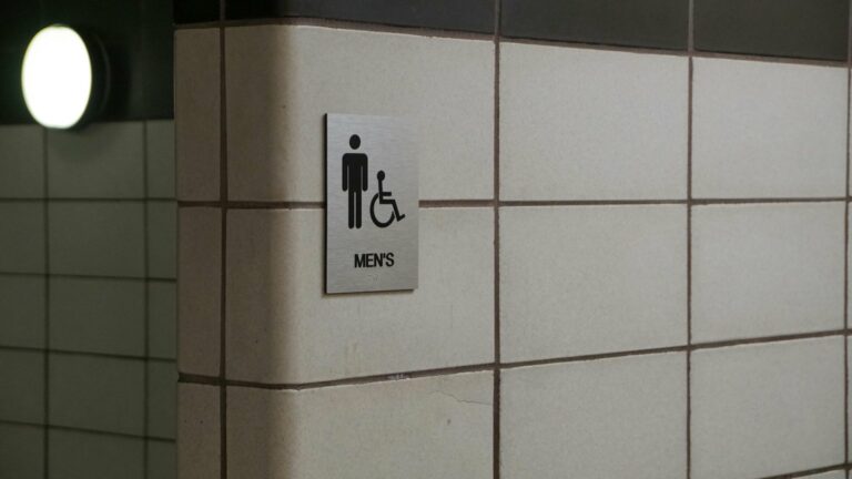 Mens and disabled public toilet sign