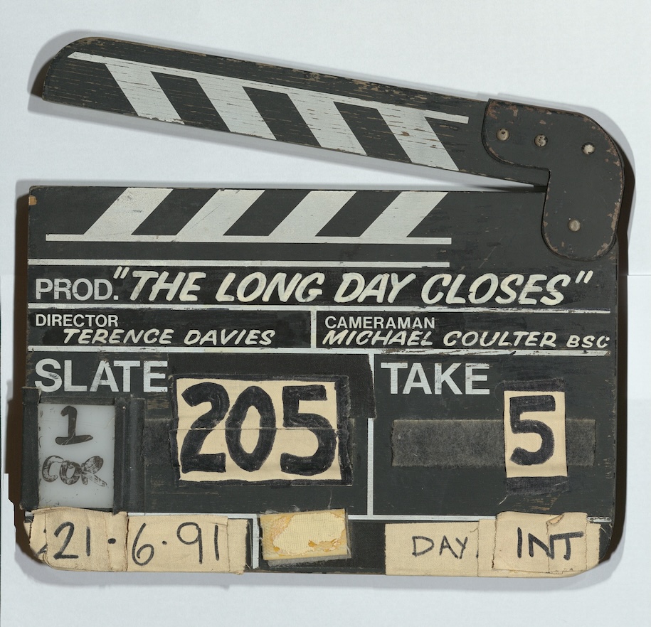 a clapper board from the set of The Long Day Closes, with the director's name, and the cameraman's name (Michael Coulter)