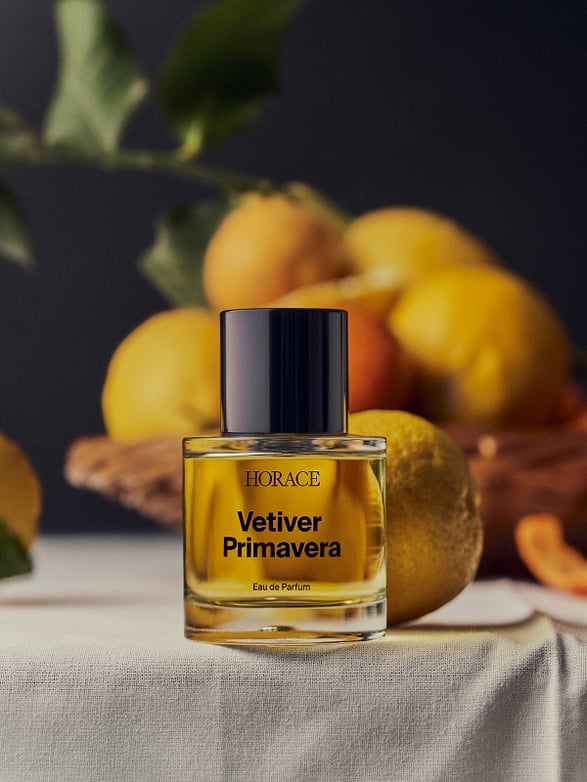 A lifestyle shot of Horace's Vetiver Primavera eau de parfum