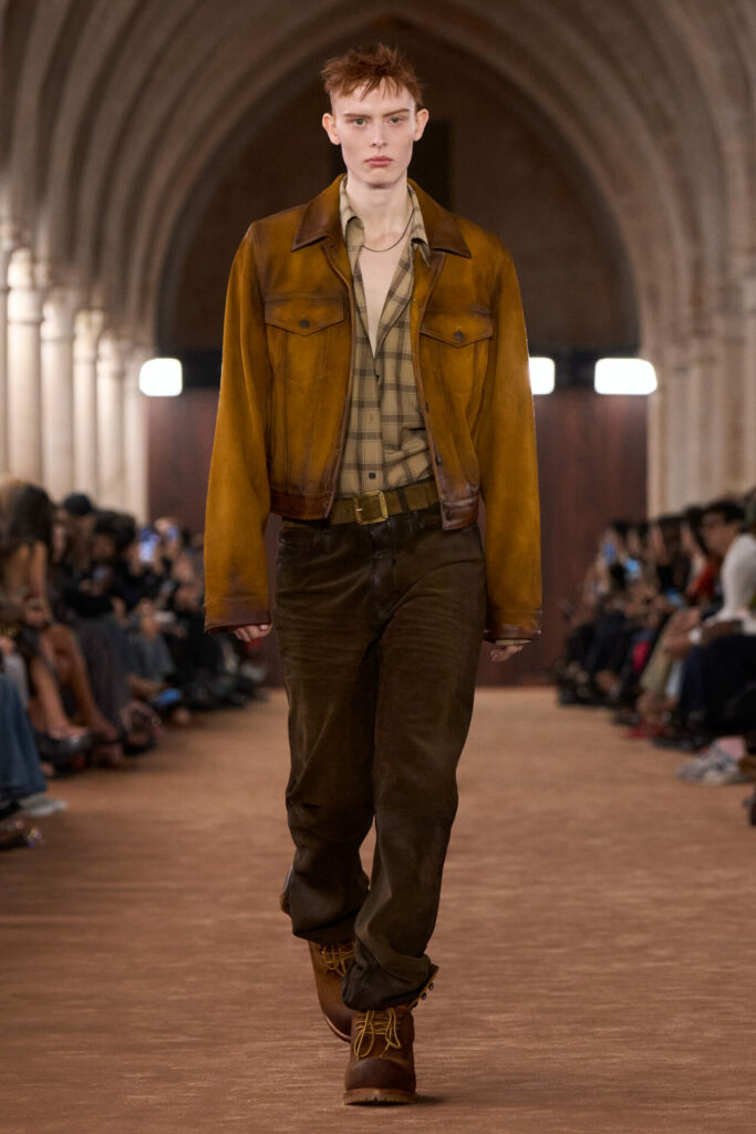 A model walks the Acne Studios Spring/Summer 2026 runway show at Paris Fashion Week.