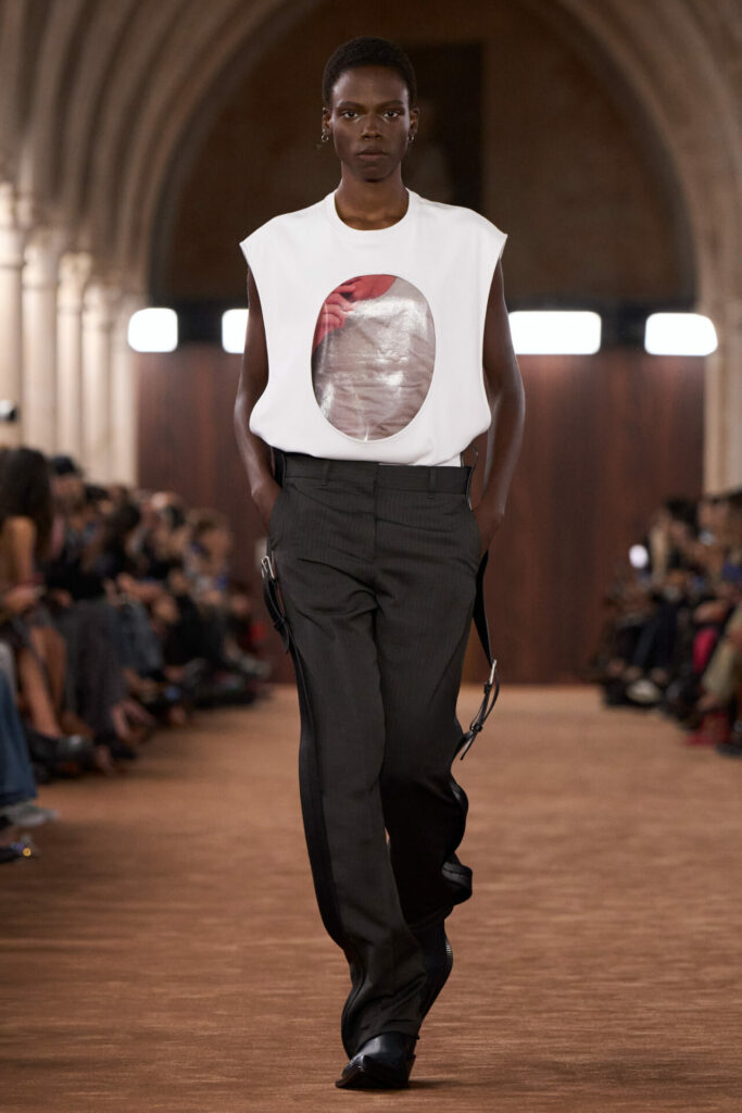 A model walks the Acne Studios Spring/Summer 2026 runway show at Paris Fashion Week.