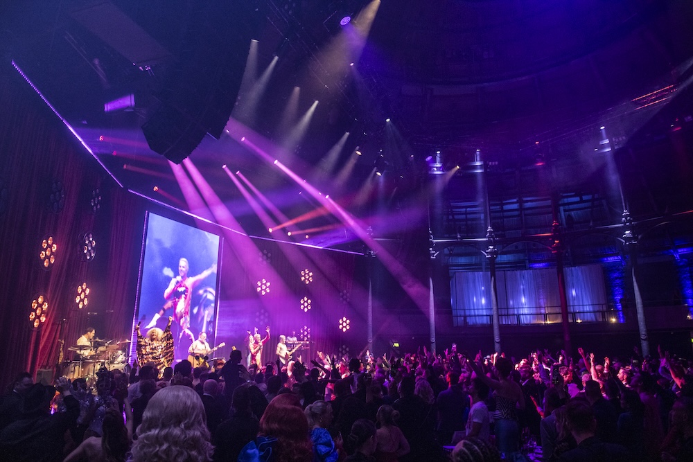 The Scissor Sisters performing on stage at the 2025 Attitude Awards with the crowd cheering