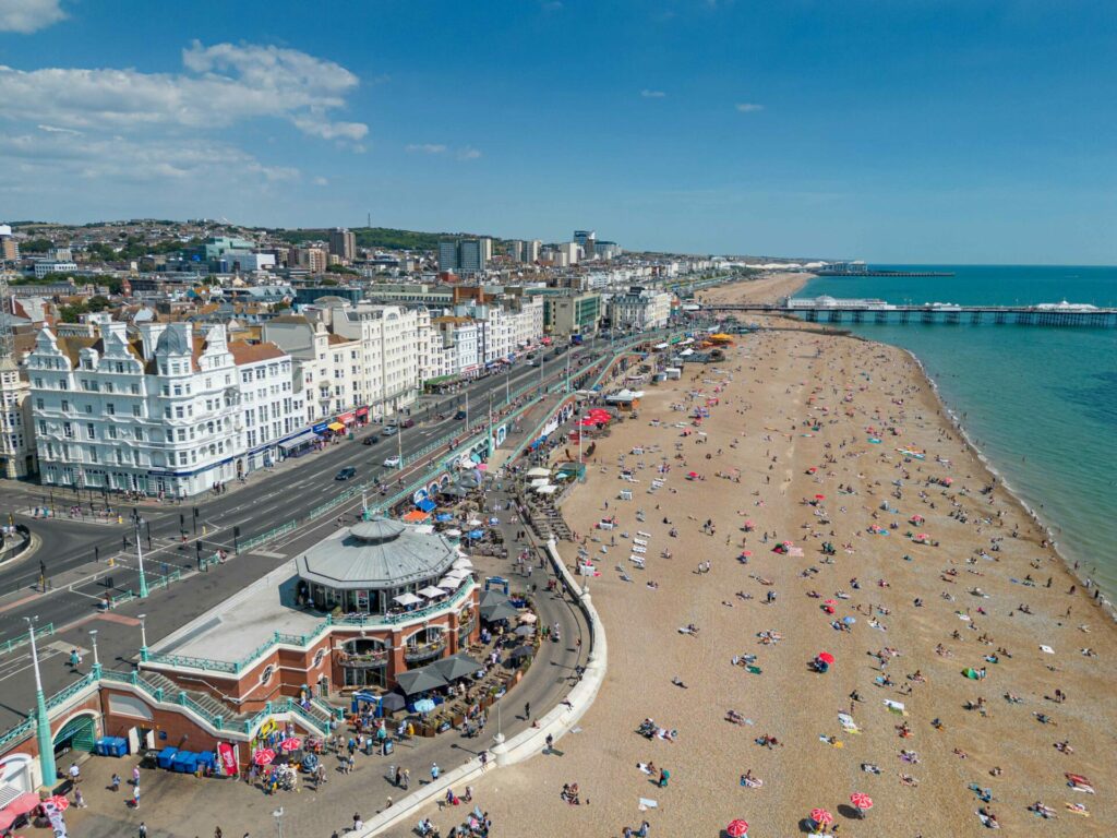 A drone shot of Brighton Beach and the Harbour Hotel Brighton