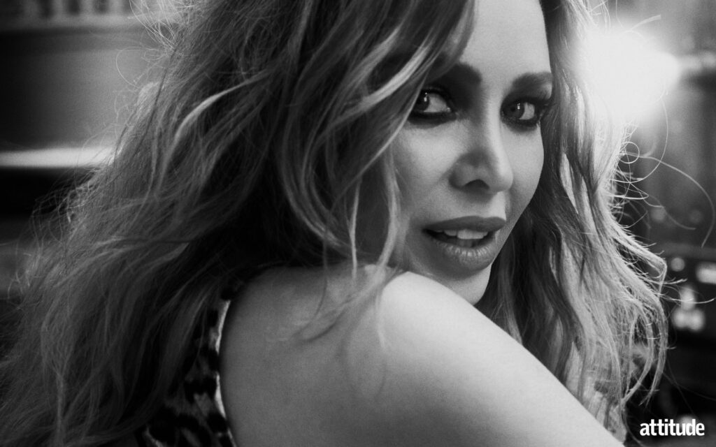 Close shot of Dannii Minogue in black and white