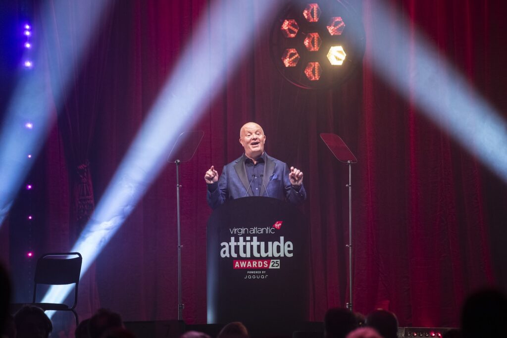 Attitude's Darren Styles OBE addressed attendees in the main room - in a blue suit, standing at a podium