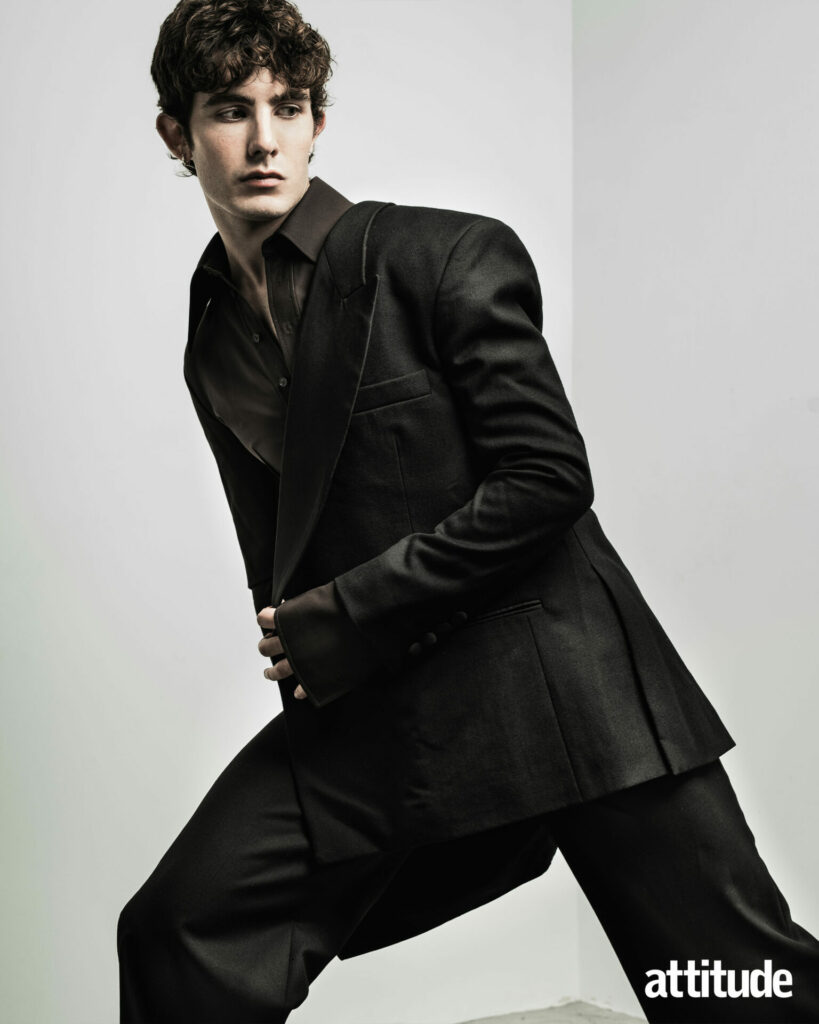 Model Edgar strikes a pose wearing a double breasted suit from Mithridate.