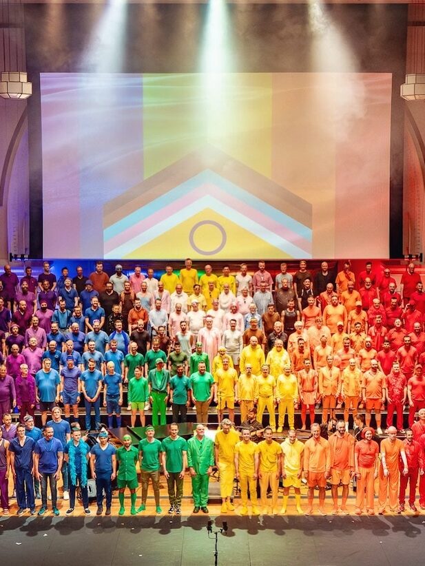 London gay men chorus in rainbow coloured clothing 