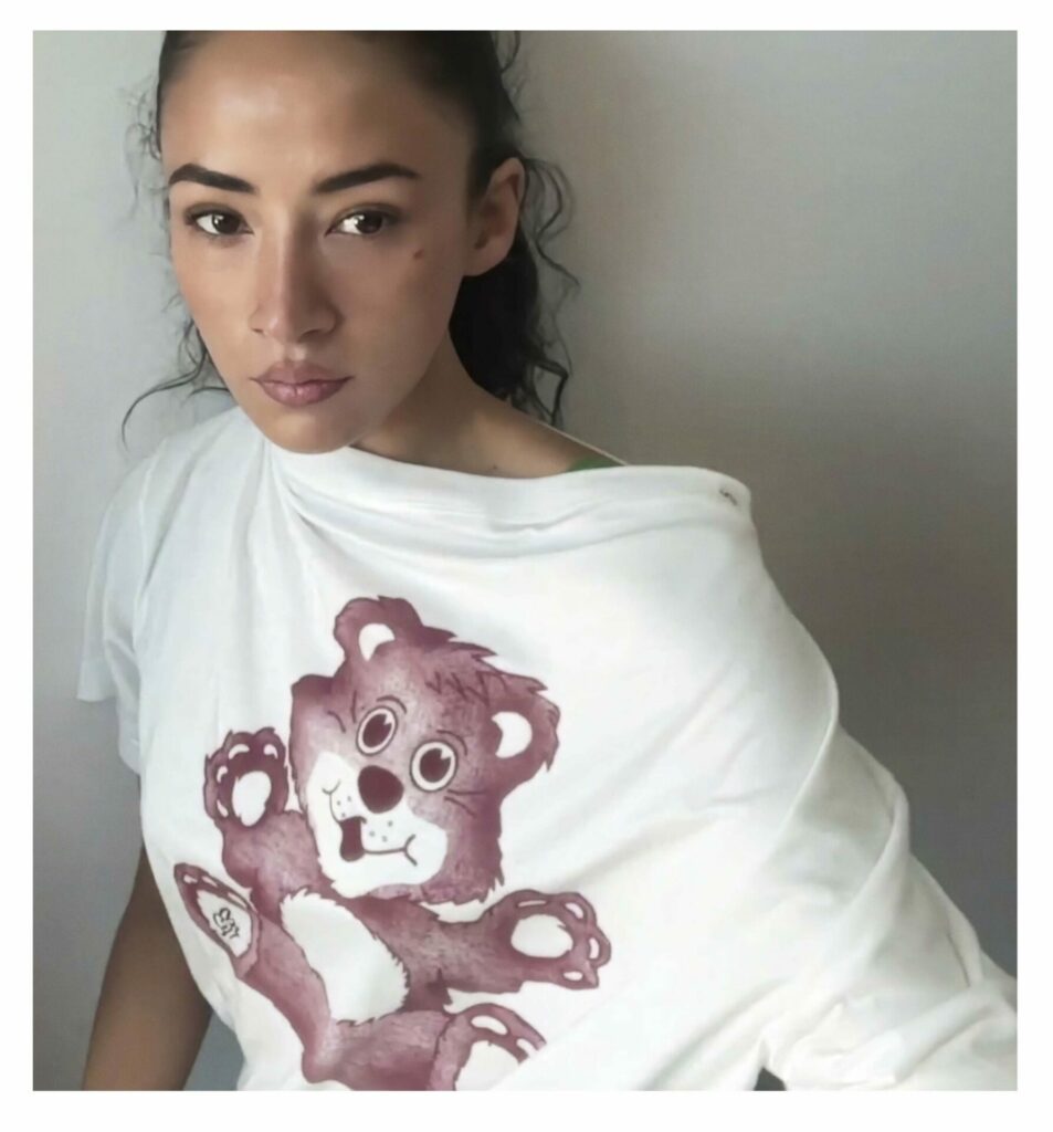 Core Corré models an archival Vivienne Westwood print as part of a charity collection for The Vivienne Foundation.