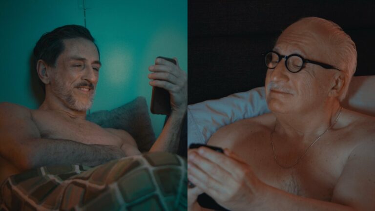 Paul James Saunders and Duff MacDonald topless in bed texting