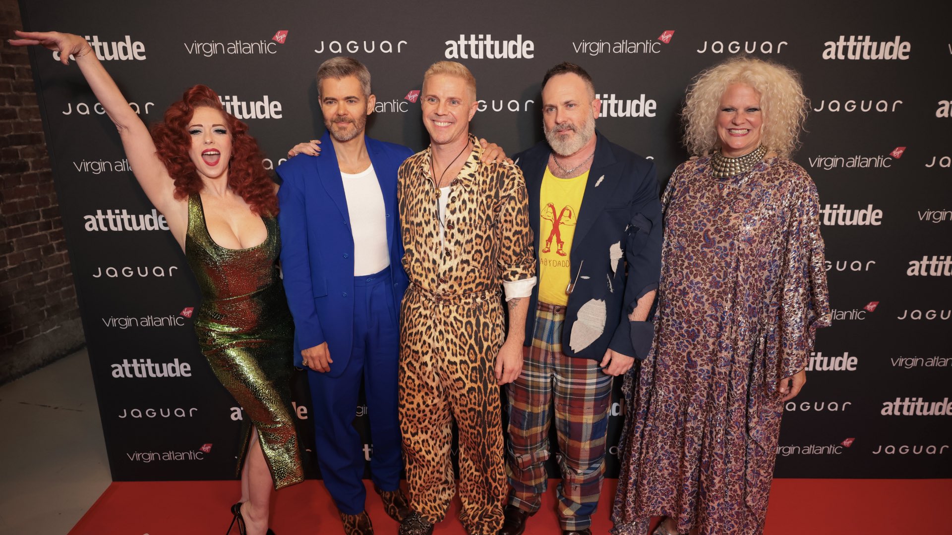 Jake Shears and the scissor sisters posing on the Virgin Atlantic Attitude Awards, powered by Jaguar red carpet