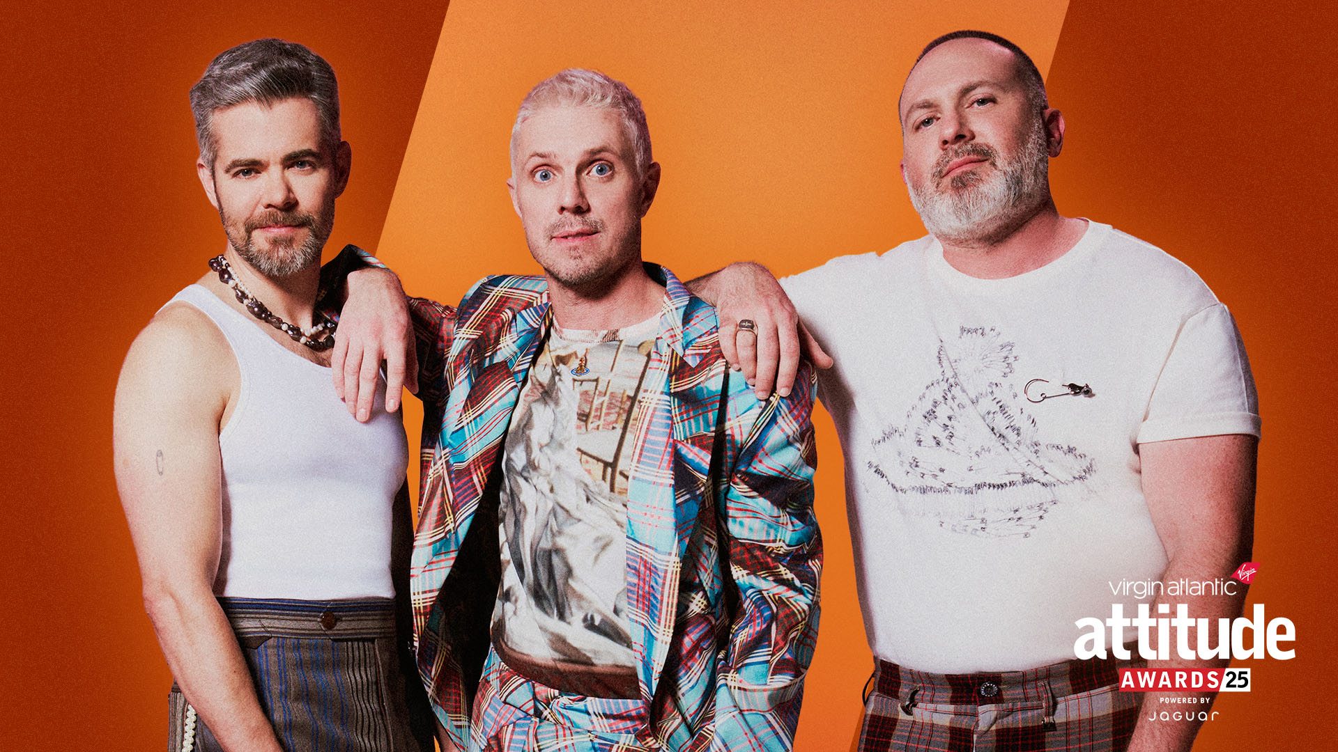 Scissor Sisters standing against a colourful backdrop