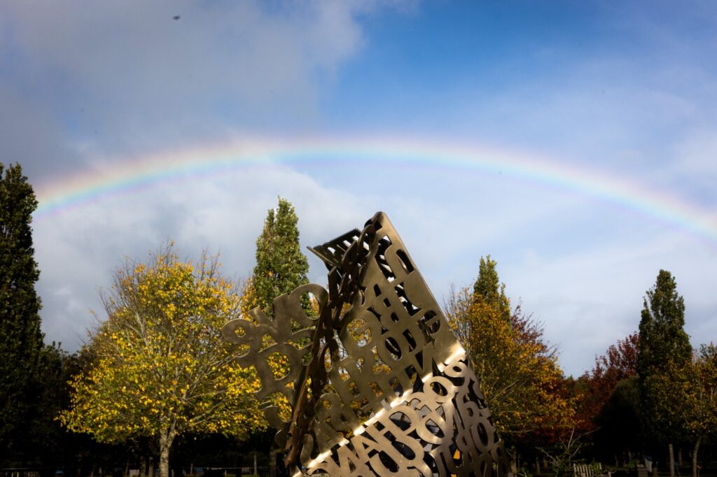 Rainbow over memorial to the Armed Forces LGBT+ community at the National Memorial Arboretum in Staffordshire