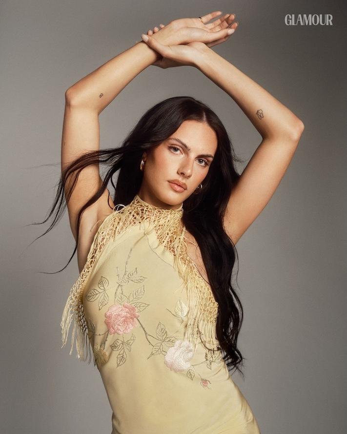 Bel Priestly in yellow floral dress