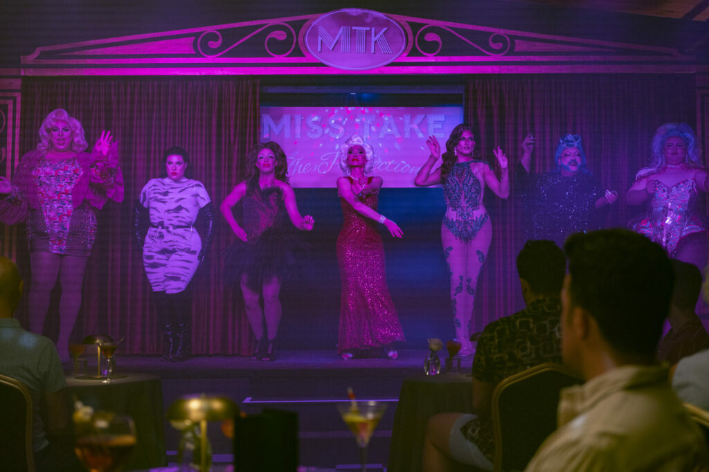 Talisa García playing Miss Take in Frauds