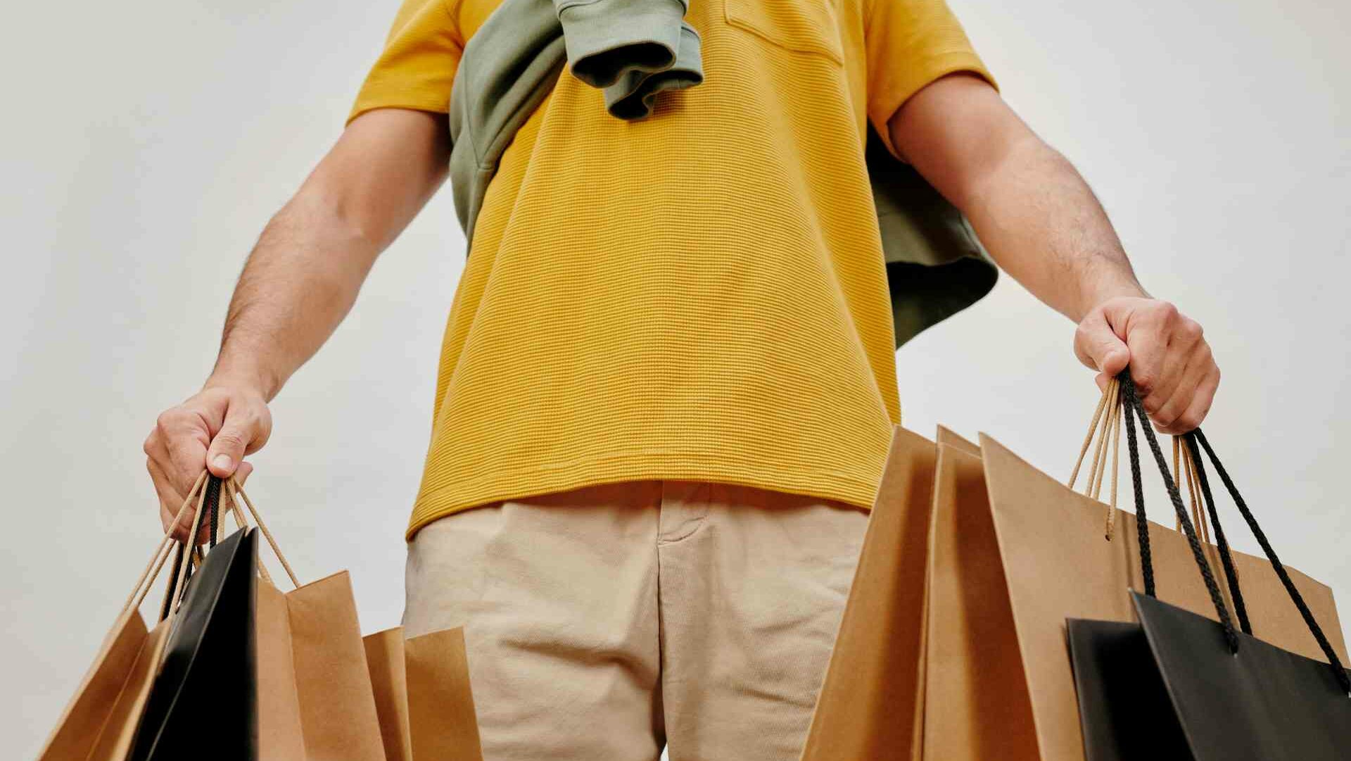 A man holding shopping bags