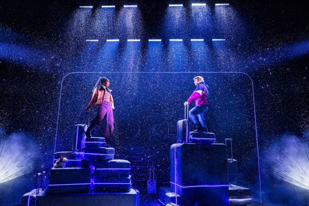 Christiani Pitts and Sam Tutty in Two Strangers (Carry a Cake Across New York on luggage