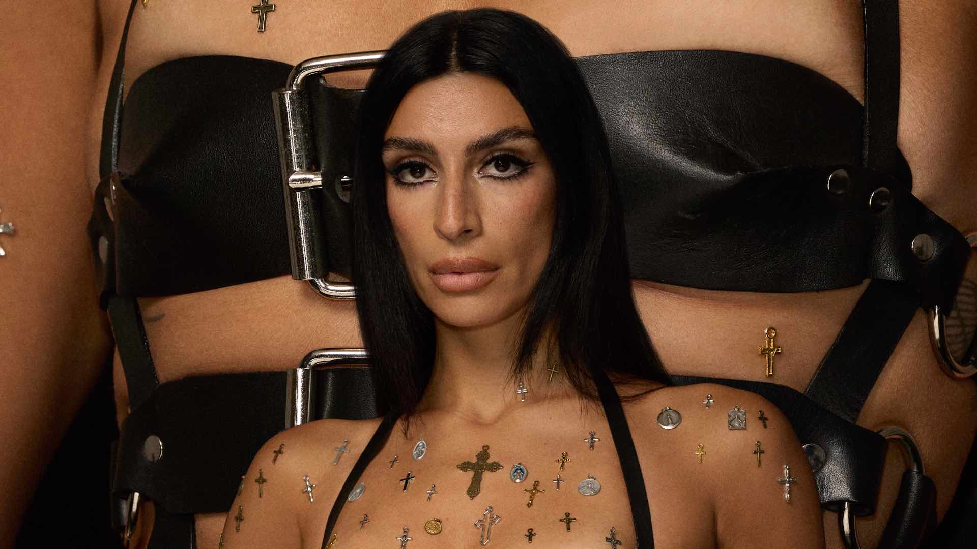 Sevdaliza with her chest in the background