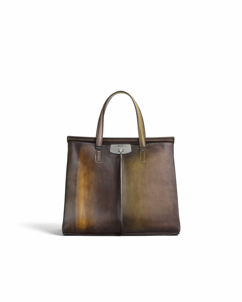 A product shot of the ombre leather patina top handle Luti Bag 38 from Berluti featured in Attitude's 2025 luxury gift guide