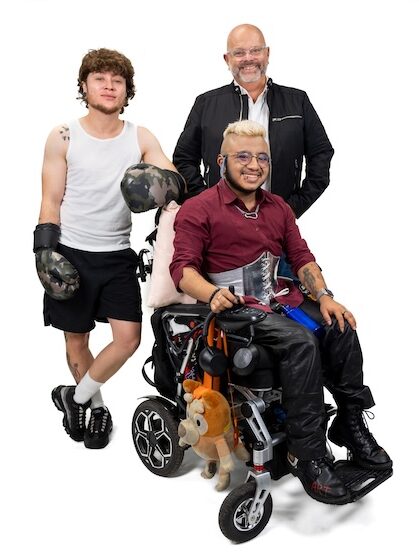 LGBT Foundation, Man Enough campaign with three people, one in a wheelchair