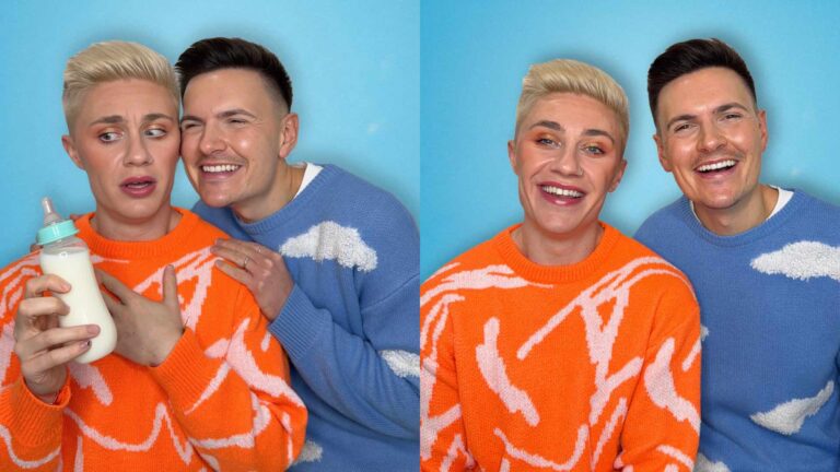 Matthew & Ryan Mackinnon wearing orange and blue holding a baby bottle