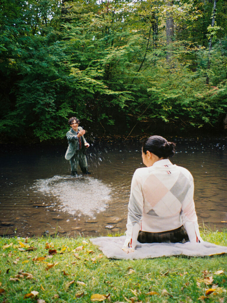 A lifestyle shot of the Thom Browne High Winter 2025 campaign