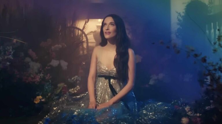 Kacey Musgraves with a rainbow