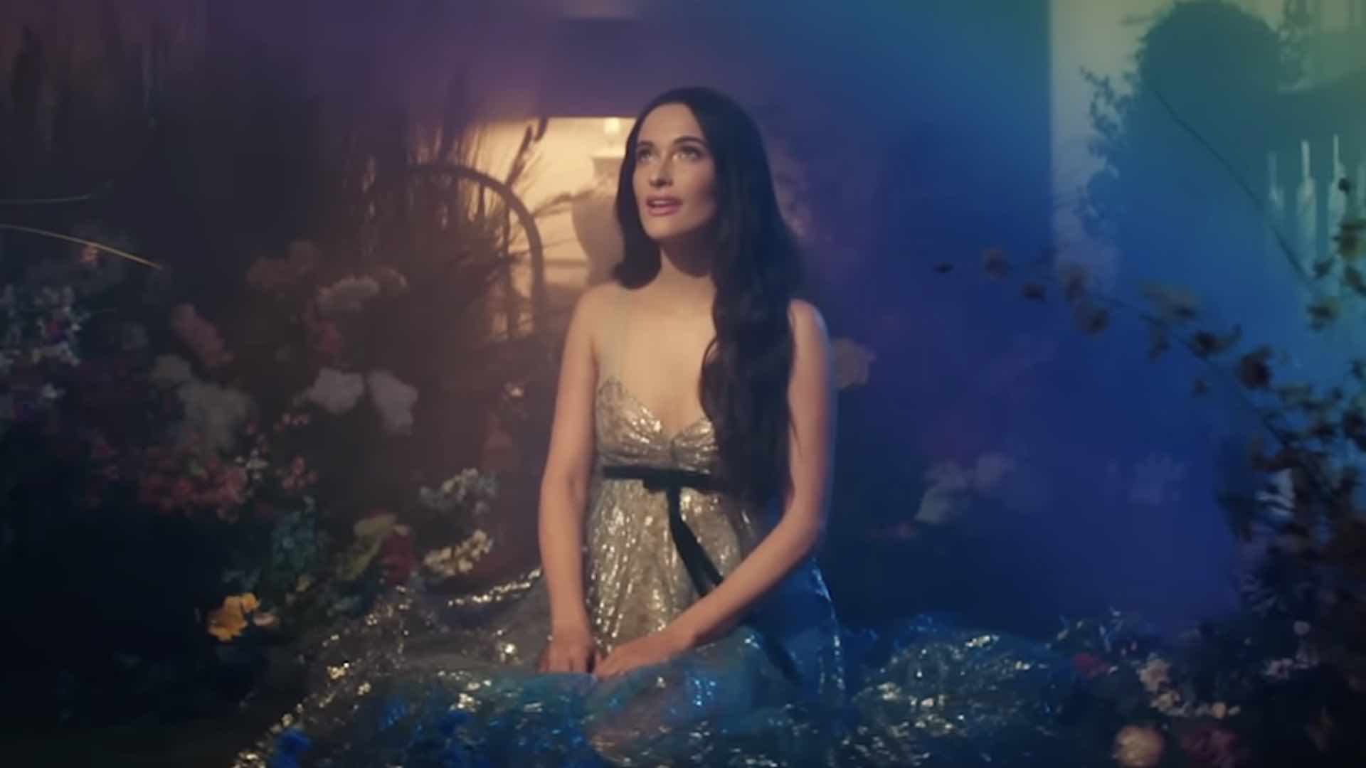 Kacey Musgraves with a rainbow