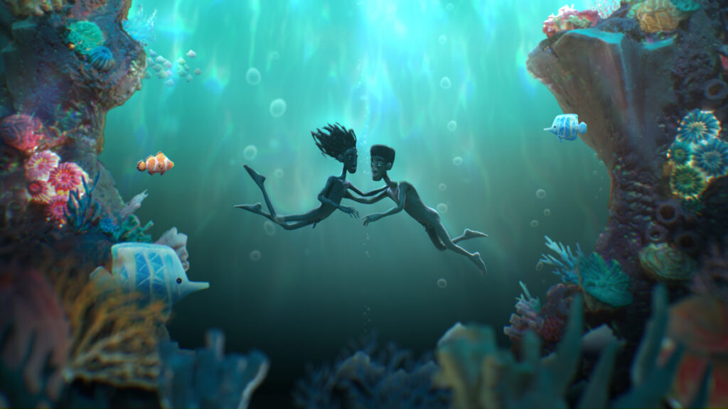 Dula and Edan swim toward each other in an underwater turquoise paradise, surrounded by coral
and colorful fish.