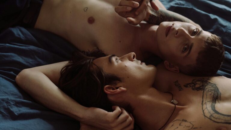 A Couple Lying on Bed