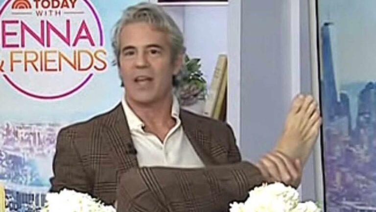 Andy Cohen showing his bare foot