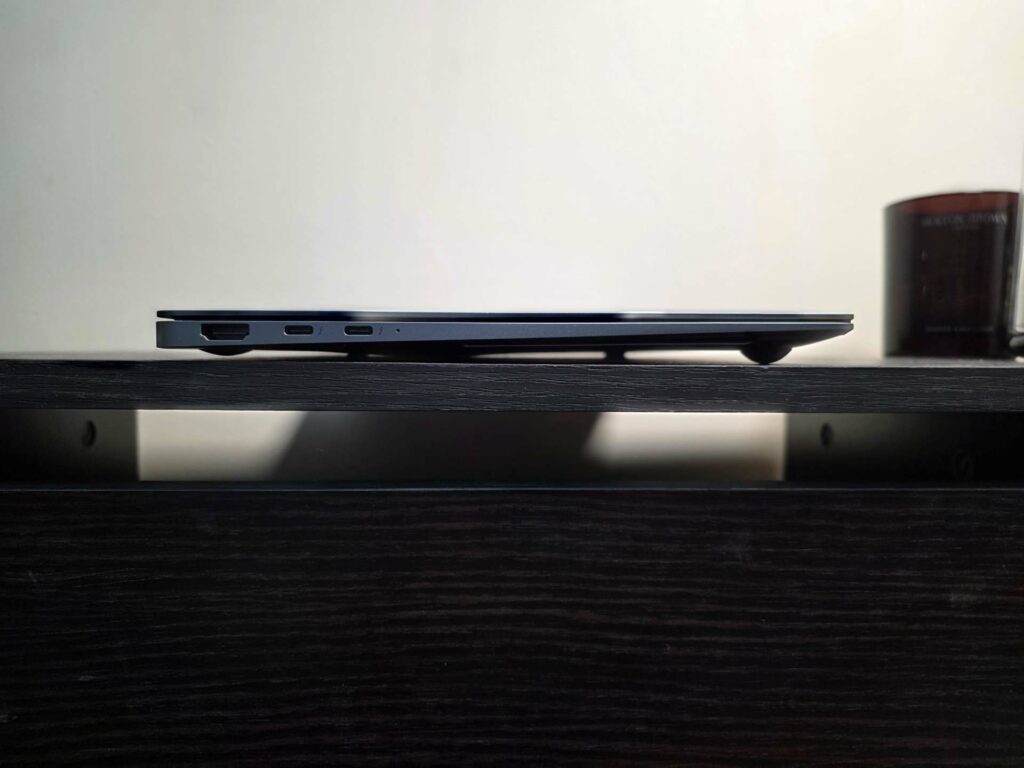 A closed Samsung laptop shown from the side