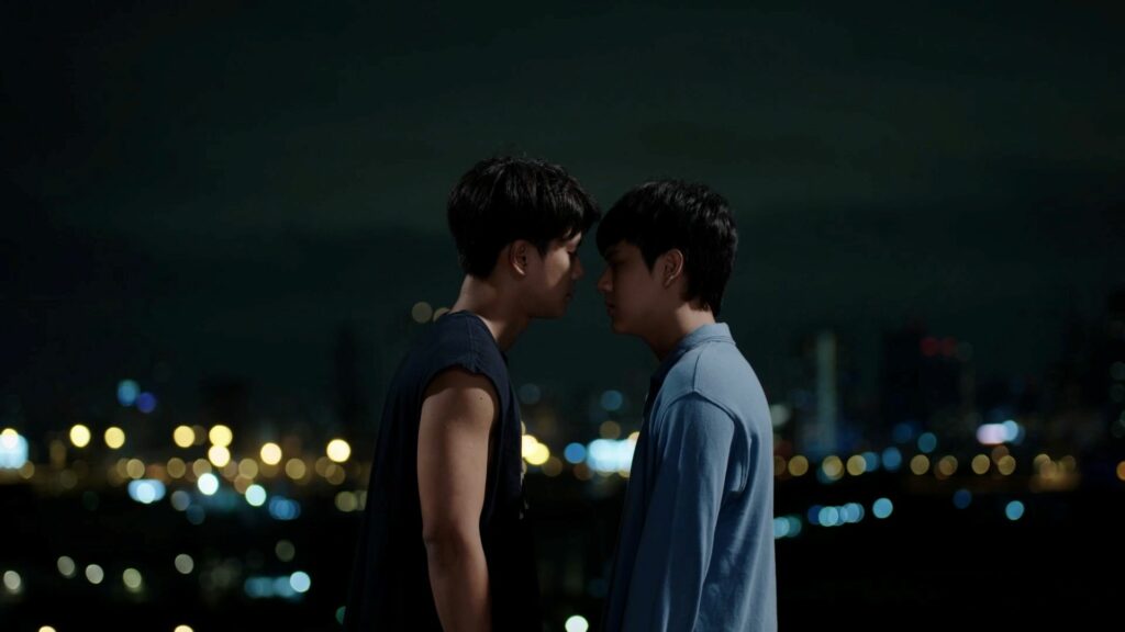 Two men embrace in Thai BL series Bad Buddy