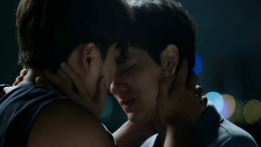 Two men closely embracing each other in Thai BL series Bad Buddy