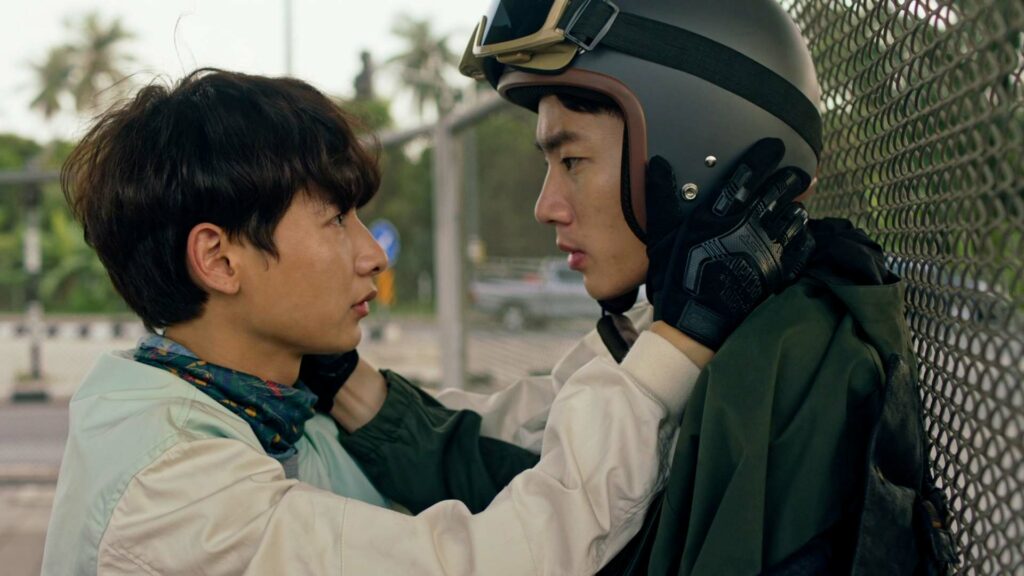 Two men sembrace and stare into each other's eyes in Thai BL series Not Me