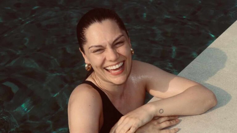 Jessie J in a pool smiling