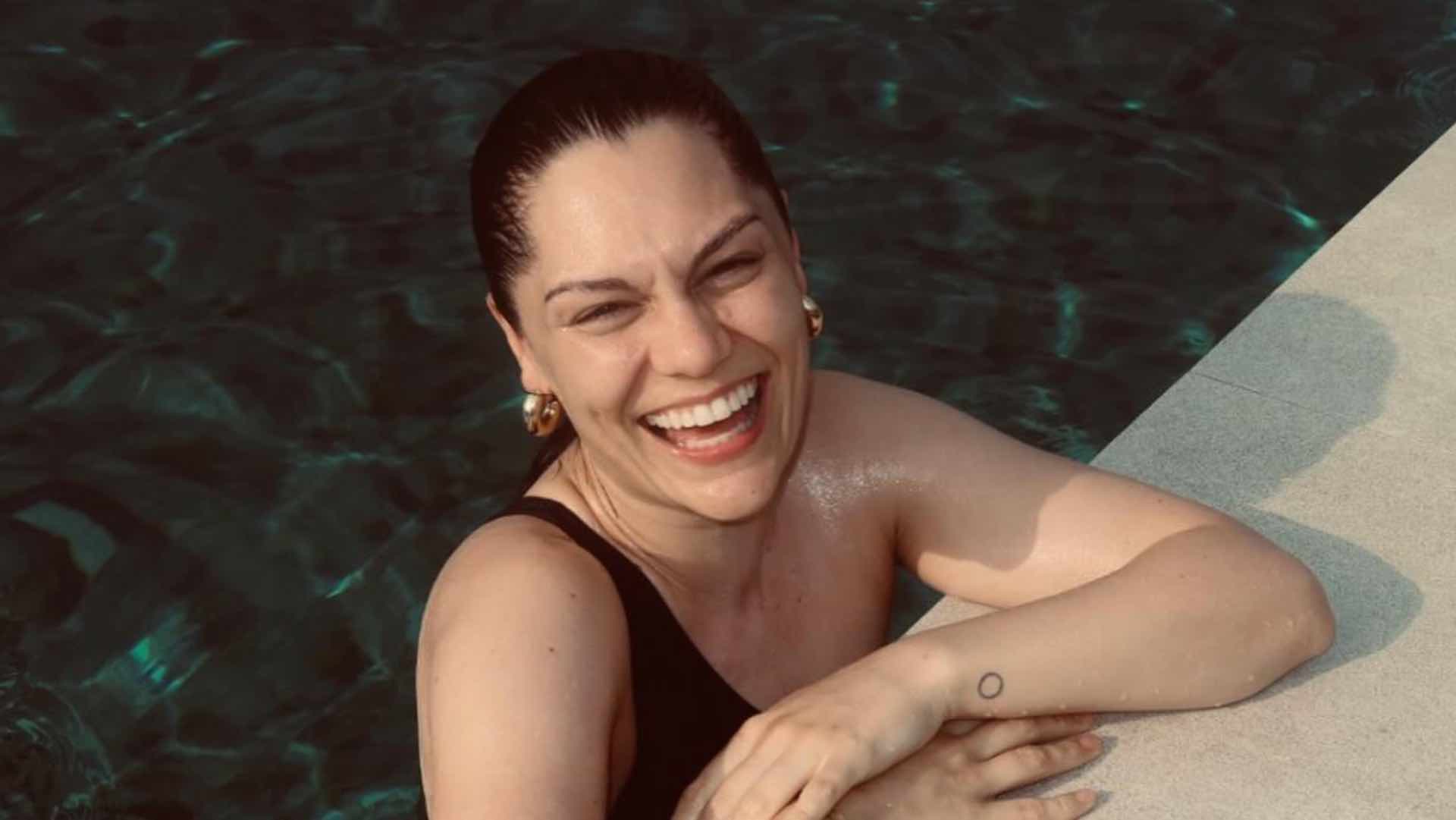 Jessie J in a pool smiling