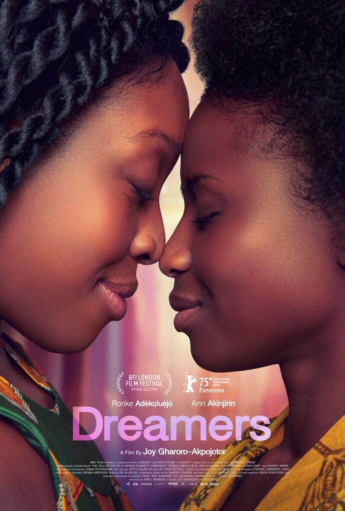 the poster for the film, featuring a close up of the two main characters touching faces