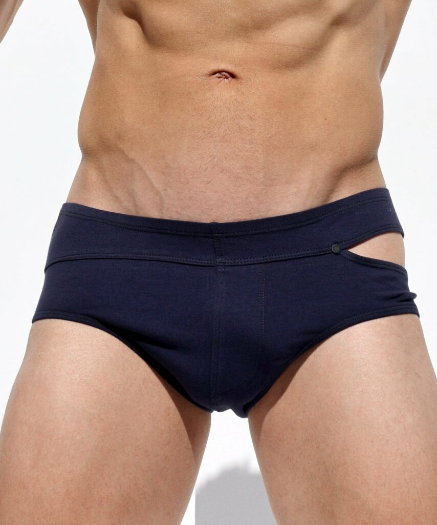 A model shot of the Rufskin Maximus cut-out brief in navy