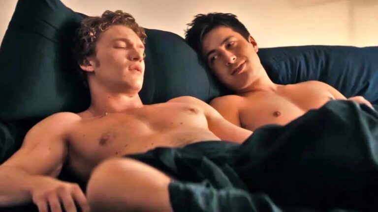 Connor Storrie and Hudson Williams shirtless in bed