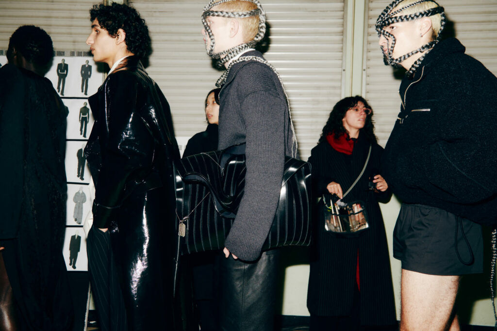 Lineup of male models backstage at the LGN Louis Gabriel Nouchi Autumn/Winter 2026 Paris Fashion Week runway show