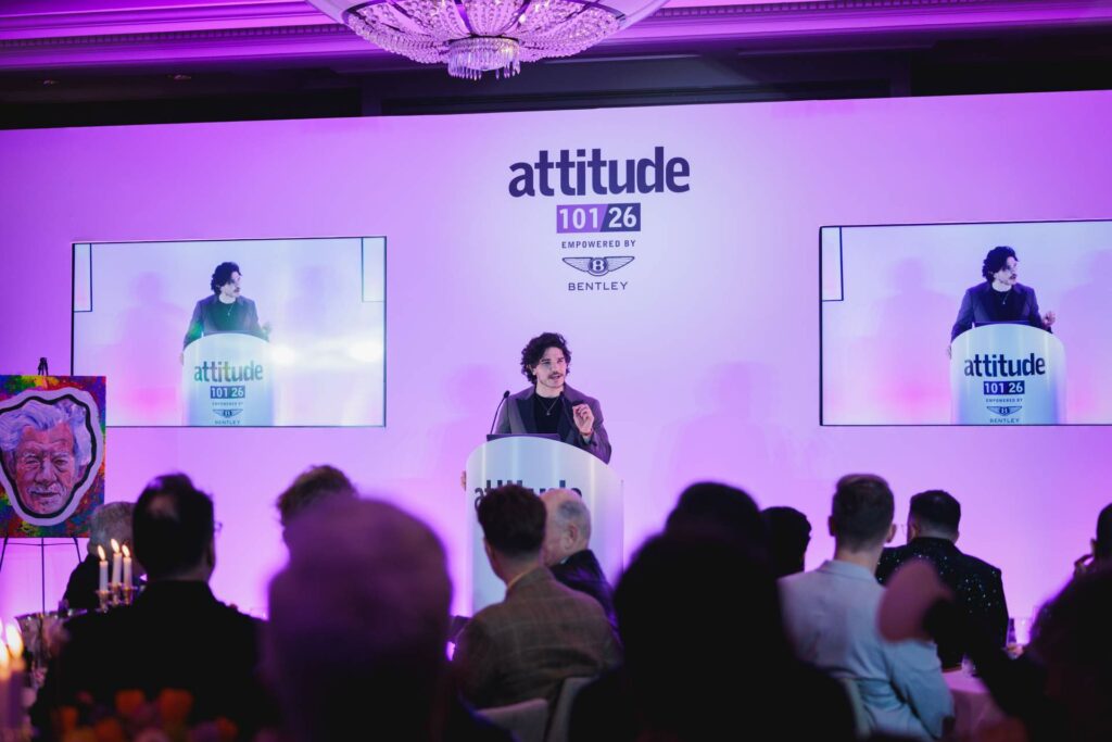 Fra Fee giving a speech at a podium at Attitude 101 2026