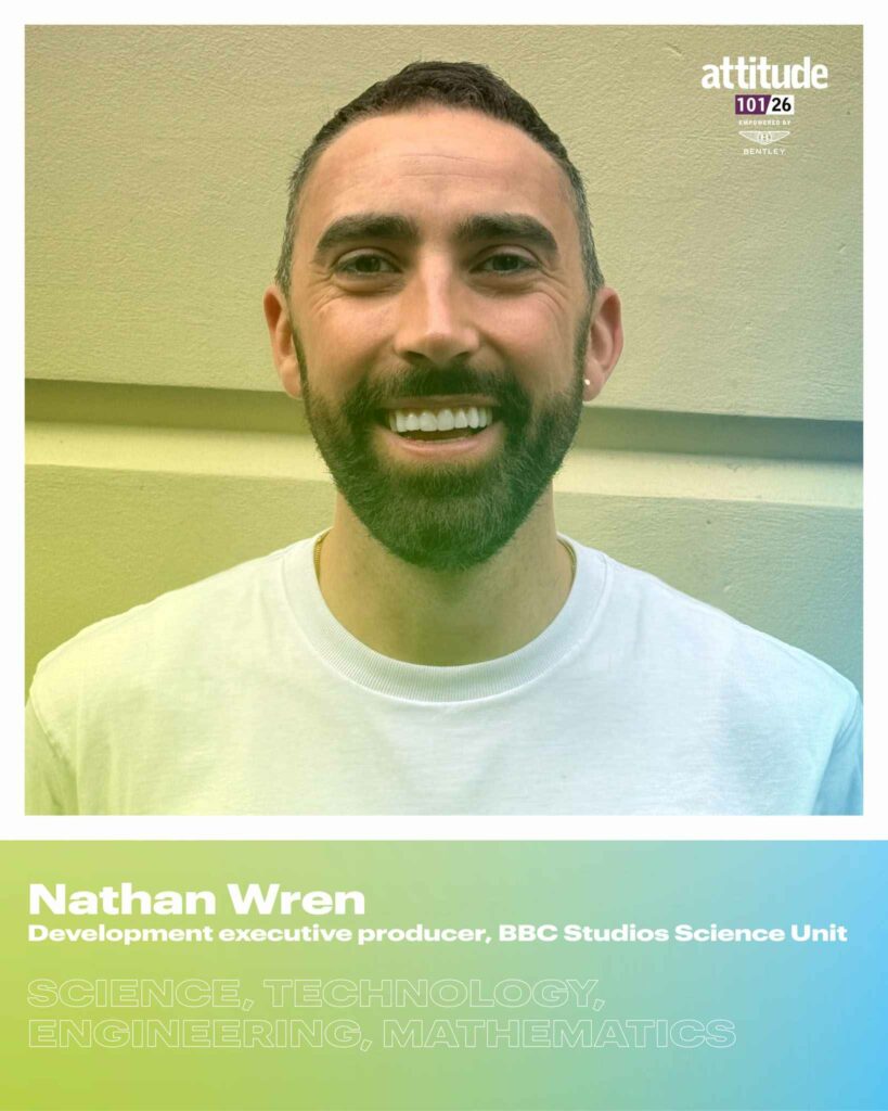 Nathan Wren smiling at the camera, wearing a plain white T-shirt against a light indoor background, with the Attitude 101 logo visible in the top corner.