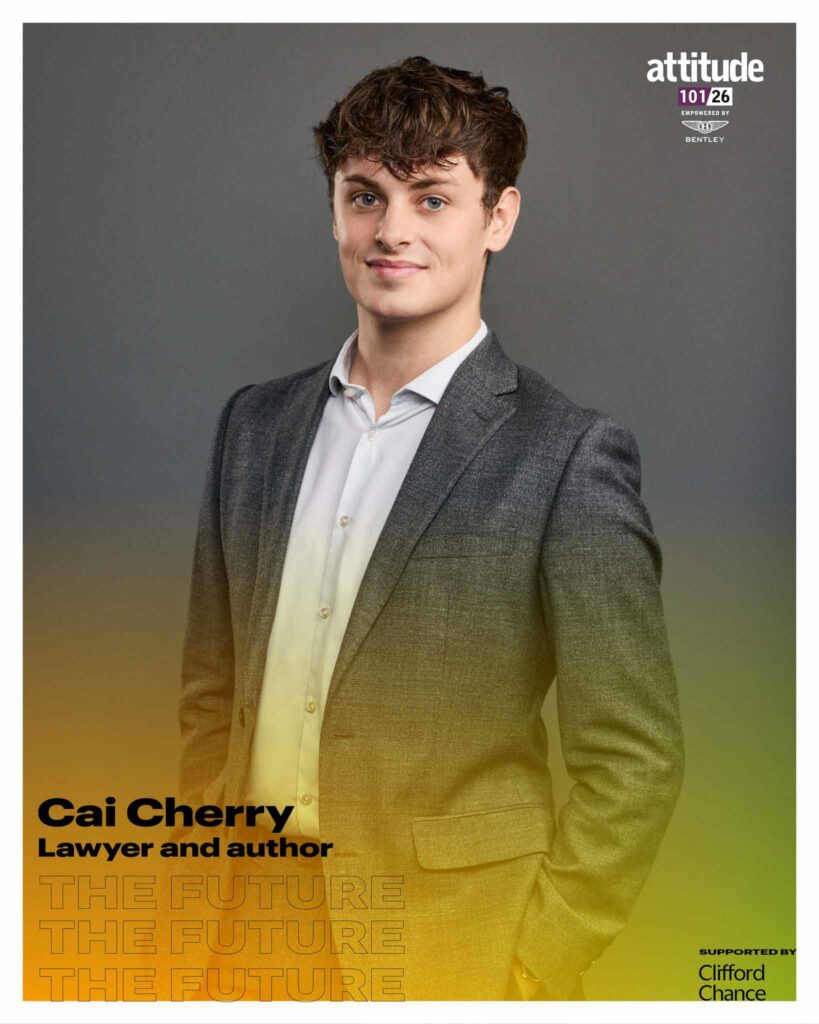Cai Cherry standing against a grey background in a dark blazer and light shirt, with the Attitude 101 logo visible in the top corner.