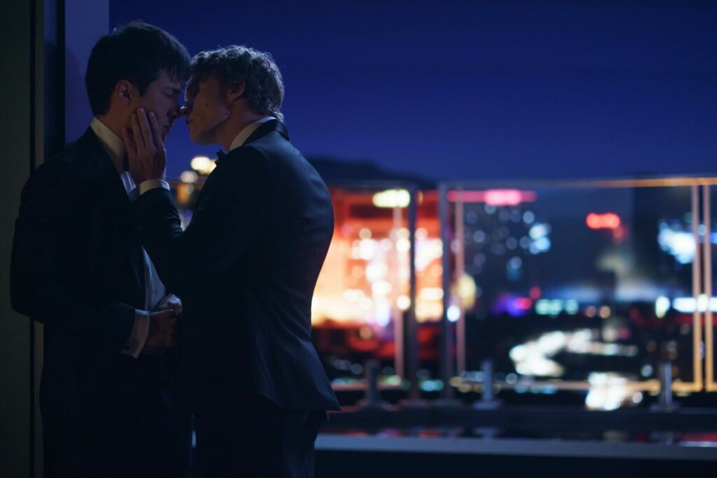 Hockey superstars Shane Hollander (Hudson Williams) and Ilya Rozanov (Connor Storrie)  meeting on the hotel roof. 