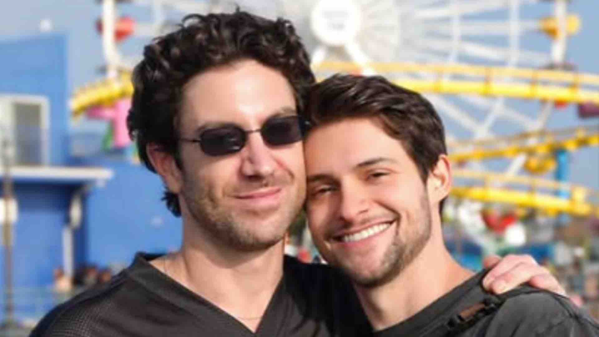 Robbie Simpson and Kyle Pollak looking cosy in front of a ferris wheel