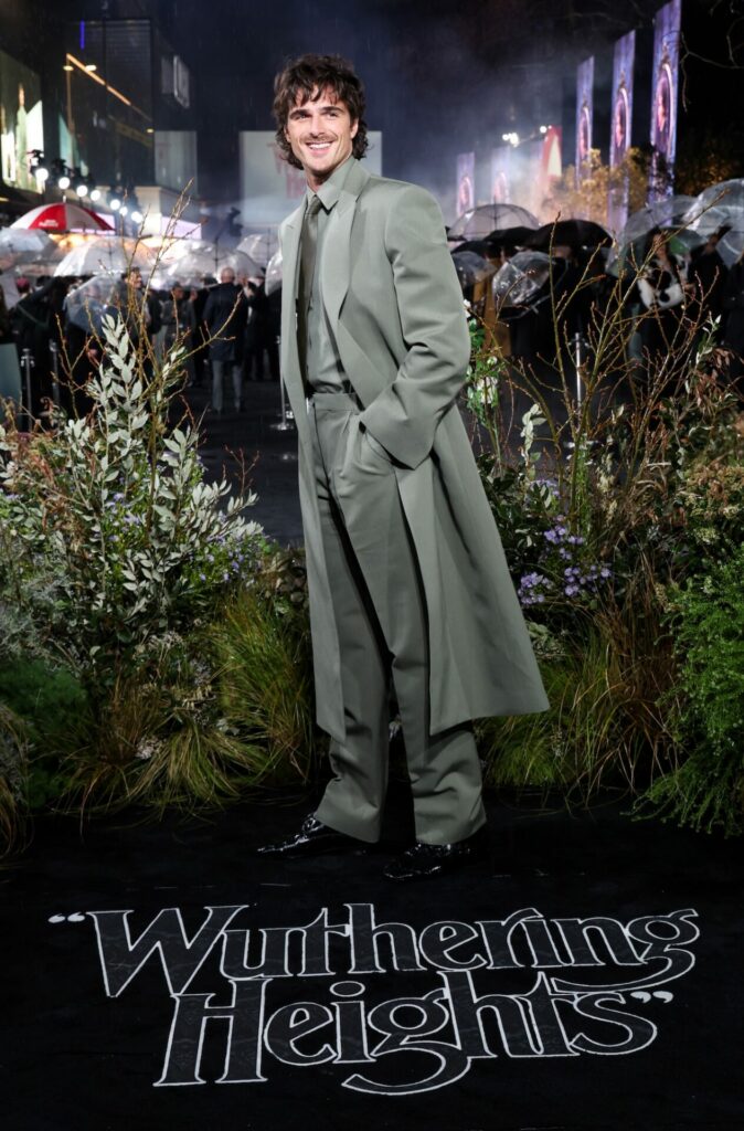 Jacob at the uk premiere of wuthering heights in a green suit