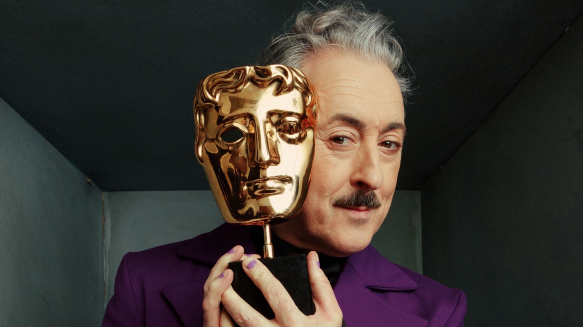 Alan Cumming in a promo image for the BAFTAs